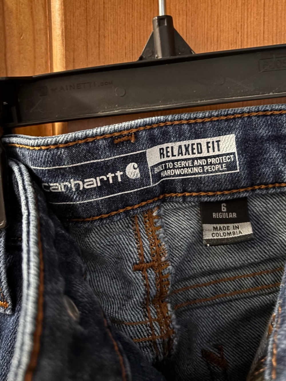 Carhartt Women’s Relaxed Fit Straight-Leg Jeans in Dark Blue Denim - Picture 3 of 4